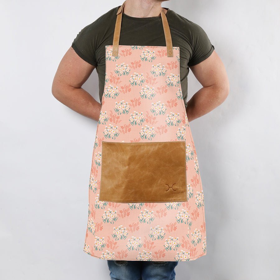 Apron | Laminated Fabric with Genuine Leather Pouch Crazy Daisy - Blush Kitchen Apron by Thandana