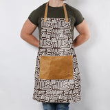 Apron | Laminated Fabric with Genuine Leather Pouch Geo - Black Kitchen Apron by Thandana