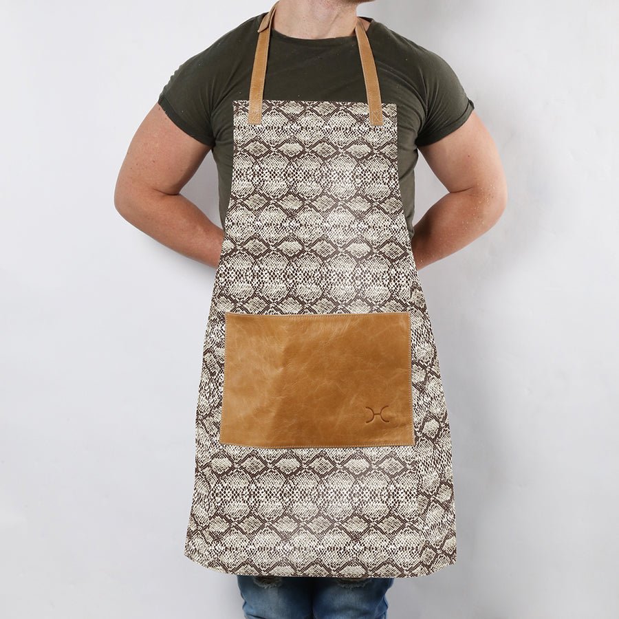 Apron | Laminated Fabric with Genuine Leather Pouch Python - Moody Kitchen Apron by Thandana