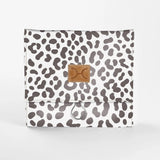 Kids Roll Up Toiletry | Laminated Fabric with Genuine Leather Cheetah - White Roll Up Toiletry Fabric by Thandana