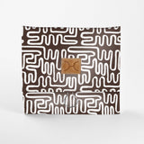 Kids Roll Up Toiletry | Laminated Fabric with Genuine Leather Geo - Black Roll Up Toiletry Fabric by Thandana