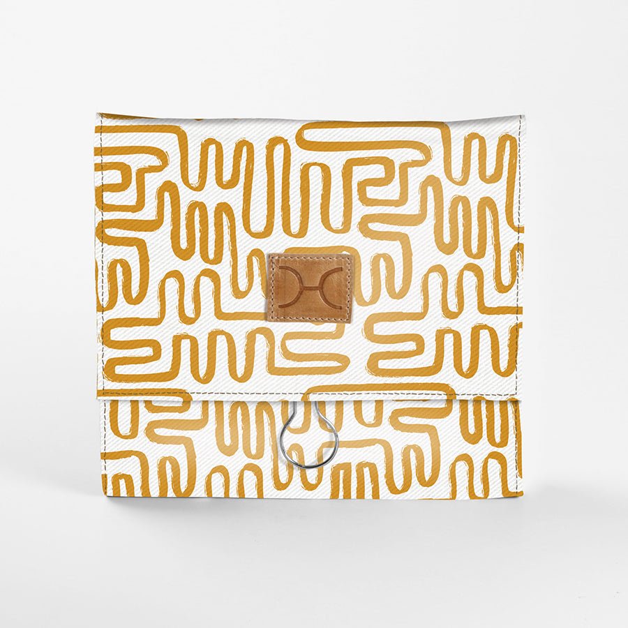 Kids Roll Up Toiletry | Laminated Fabric with Genuine Leather Geo - Sand Roll Up Toiletry Fabric by Thandana