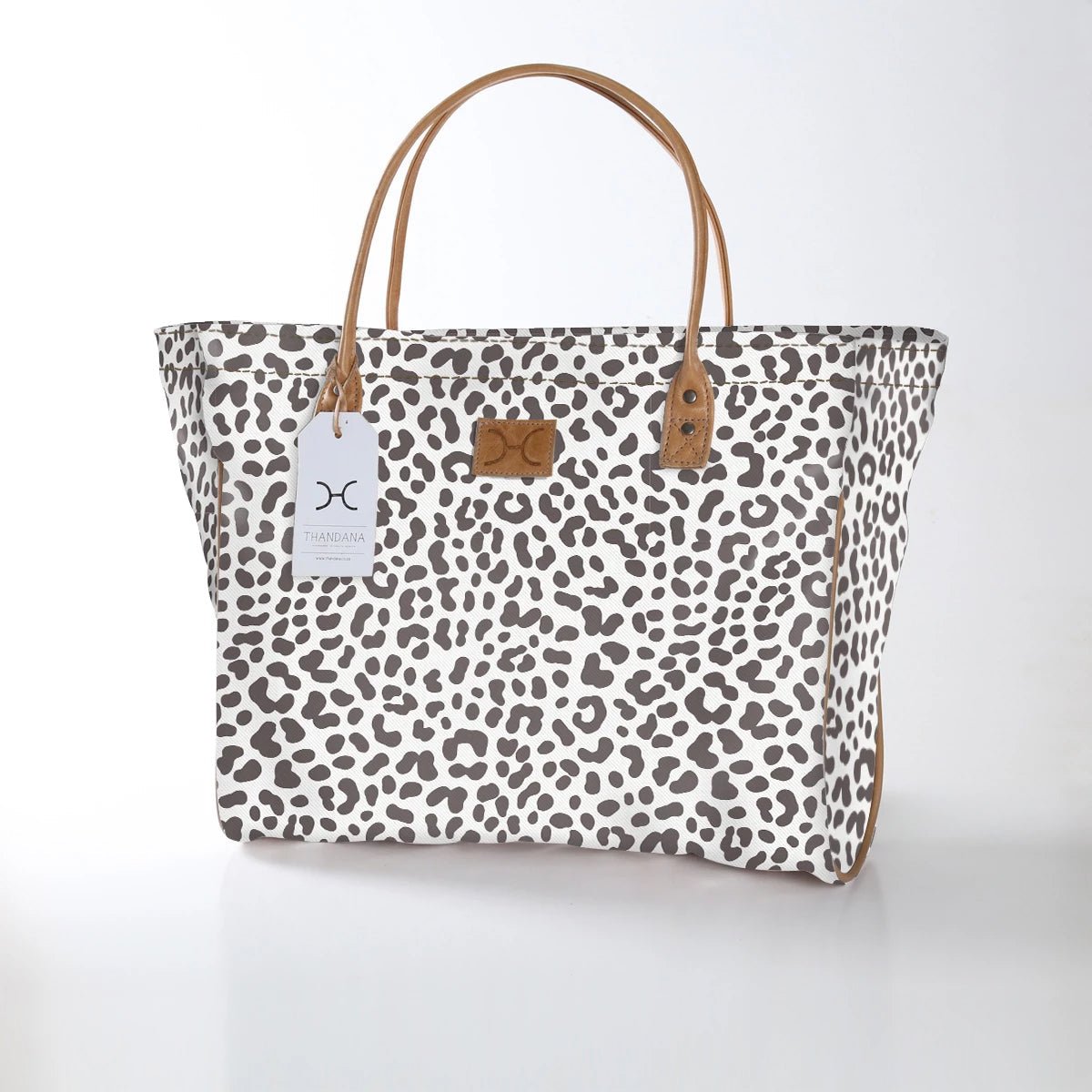 Kids Utility Shopper Bag | Laminated Fabric Cheetah - White Utility Shopper Bag by Thandana