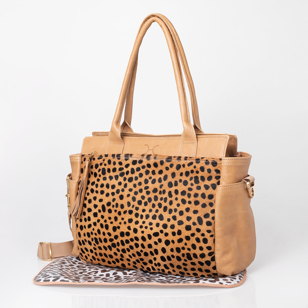 Noa Baby Changing Bag | Print Faux Fur Genuine Leather Hazelnut with Cheetah Beige / Gunmetal (default) Nappy Bag