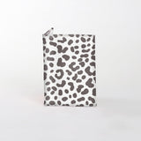Passport Holder | Laminated Fabric Cheetah - White / Chunky Zip Passport Holder by Thandana