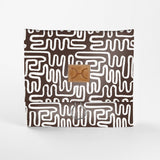 Roll Up Toiletry | Laminated Fabric with Genuine Leather Geo - Black / Chunky Zip Roll Up Toiletry Fabric by Thandana