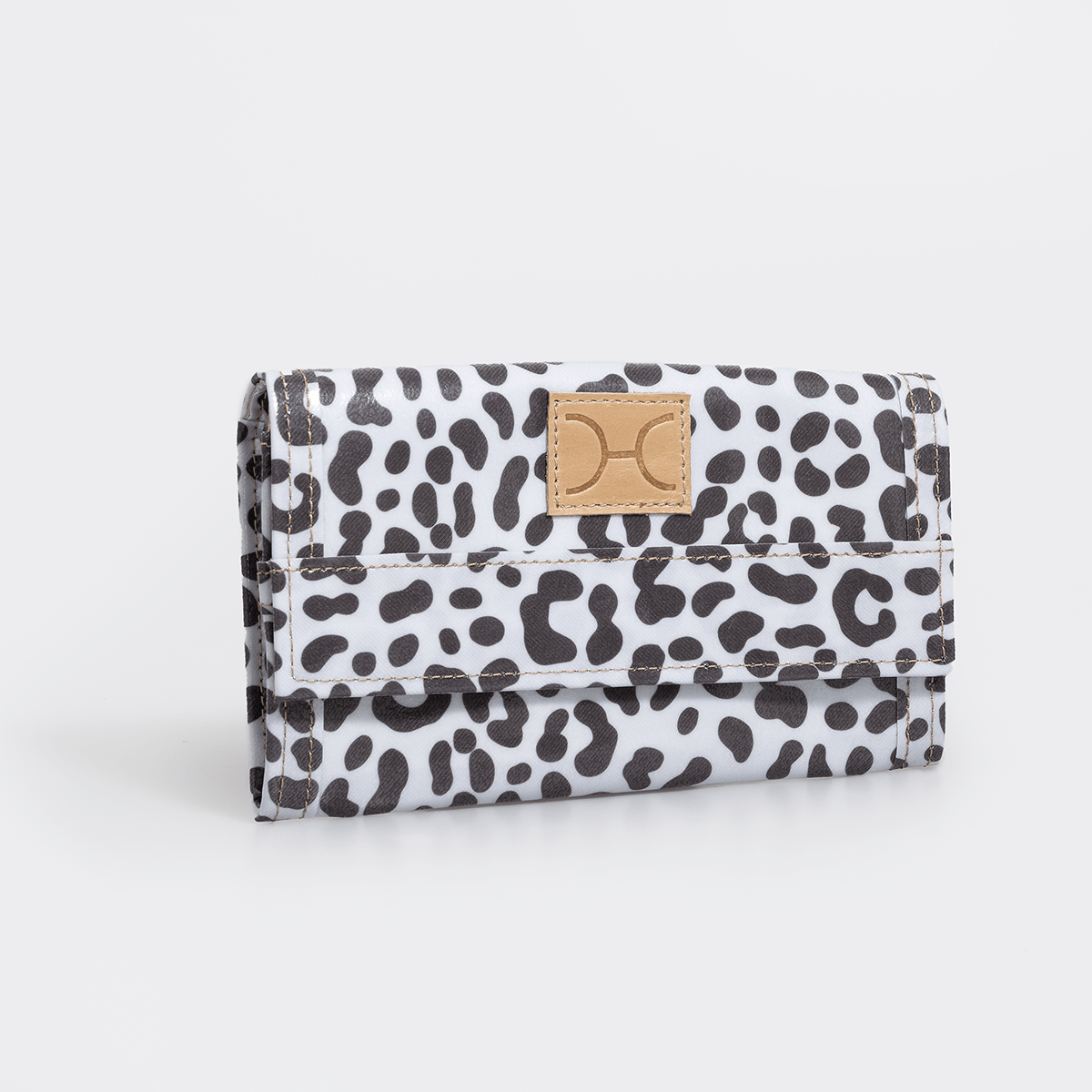 Travel Wallet | Laminated Fabric Cheetah - White / Chunky Zip Travel Wallet Fabric by Thandana
