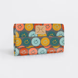Travel Wallet | Laminated Fabric Smiley - Jet / Chunky Zip Travel Wallet Fabric by Thandana